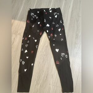 Fabletics Black Leggings with White and Red Heart Print